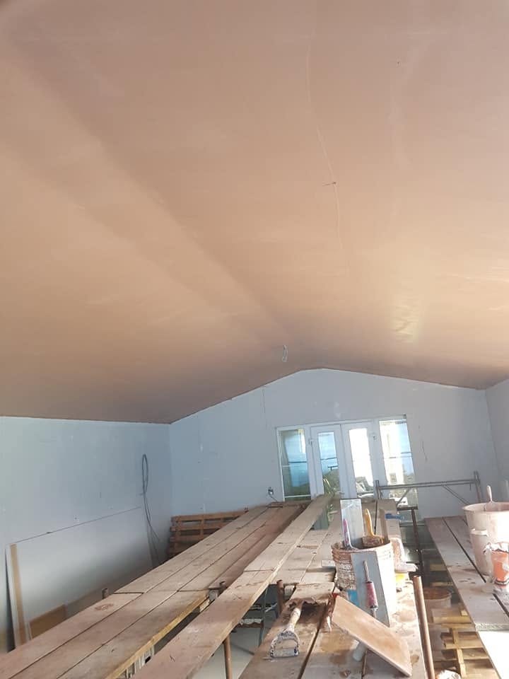Newly plastered vaulted ceiling in a Liverpool home
